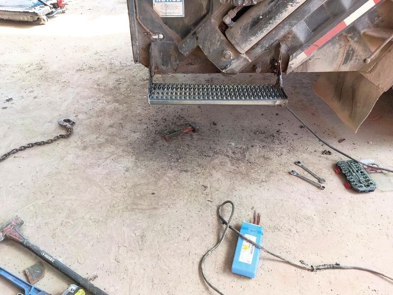 New fabricated grip-strut truck step welded in place on-site